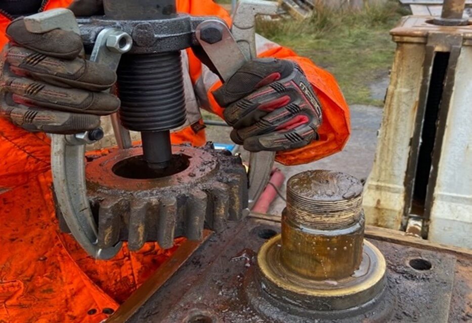 Dismantling existing manual operator.