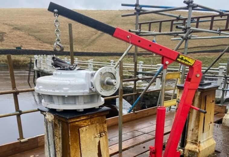 Gearboxes being lifted into position.